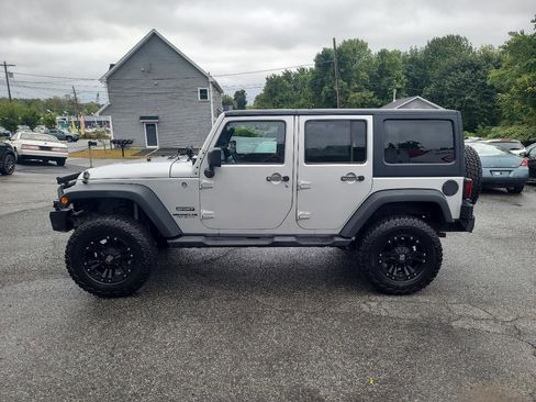 Used 2012 Jeep Wrangler Unlimited Sport w/ Dual Top Group AWD/4WD image 4