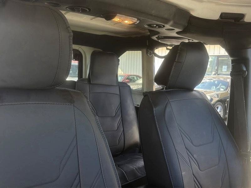 Used 2014 Jeep Wrangler Unlimited Sahara w/ Dual Top Group AWD/4WD image 19