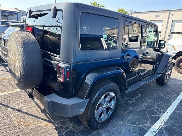 Used 2017 Jeep Wrangler Unlimited Sahara w/ Dual Top Group AWD/4WD image 2