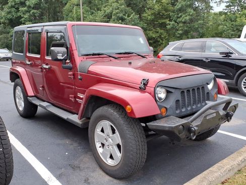 Used 2012 Jeep Wrangler Unlimited Sahara w/ Dual Top Group AWD/4WD image 2