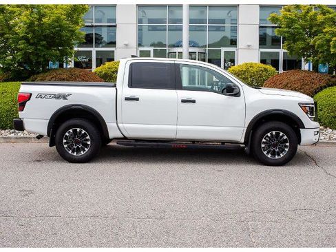 Used 2024 Nissan Titan PRO-4X w/ Pro-4x Utility Package AWD/4WD image 1