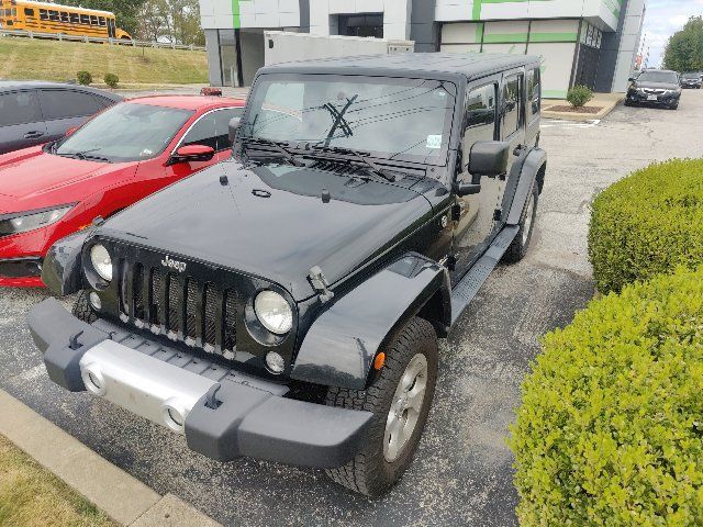 Used 2014 Jeep Wrangler Unlimited Sahara w/ Dual Top Group AWD/4WD image 3