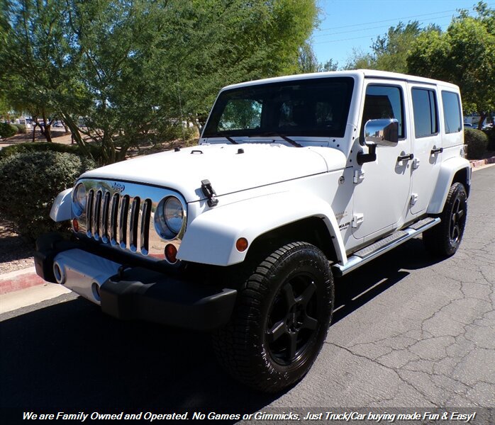 Used 2012 Jeep Wrangler Unlimited Sahara w/ Dual Top Group AWD/4WD image 3