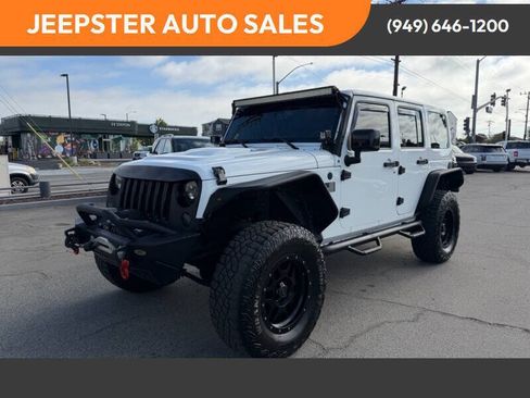 Used 2015 Jeep Wrangler Unlimited Sahara AWD/4WD image 1