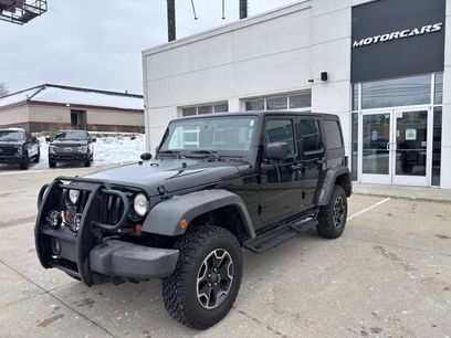Used 2011 Jeep Wrangler Unlimited Rubicon w/ Dual Top Group