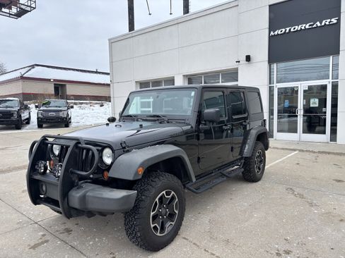Used 2011 Jeep Wrangler Unlimited Rubicon w/ Dual Top Group image 1