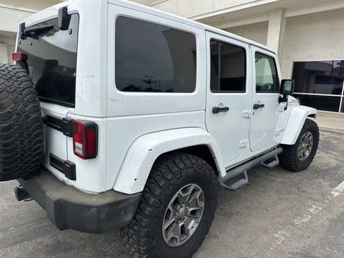 Used 2015 Jeep Wrangler Unlimited Rubicon w/ Dual Top Group AWD/4WD image 17