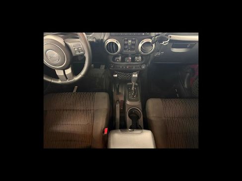 Used 2012 Jeep Wrangler Unlimited Sahara w/ Dual Top Group AWD/4WD image 16