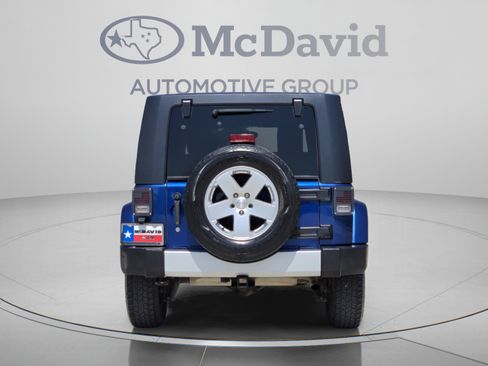 Used 2010 Jeep Wrangler Unlimited Sahara w/ Dual Top Group AWD/4WD image 5