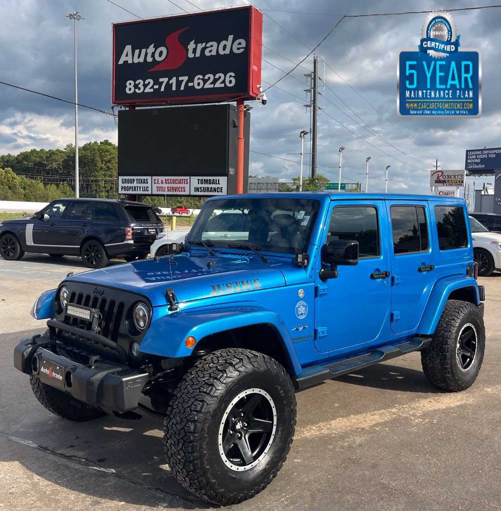 Used 2014 Jeep Wrangler Unlimited Sahara AWD/4WD image 1