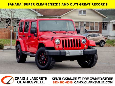 Used 2014 Jeep Wrangler Unlimited Sahara w/ Max Tow Package image 1