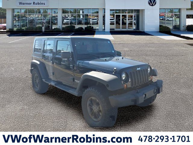 Used 2013 Jeep Wrangler Unlimited Sport w/ Trailer Tow Group AWD/4WD image 1