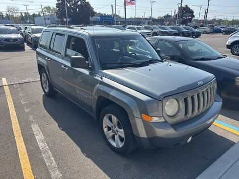 Used 2013 Jeep Patriot Latitude w/ Sun/Sound Group FWD image 1