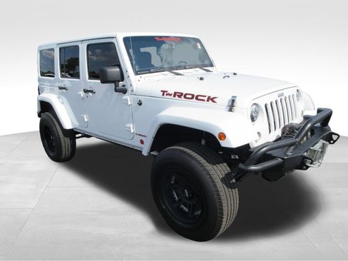 Used 2014 Jeep Wrangler Unlimited Sahara w/ Dual Top Group AWD/4WD image 7