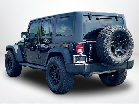 Used 2016 Jeep Wrangler Unlimited Sport w/ Mopar Black Appearance Group AWD/4WD image 12