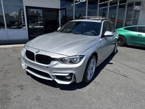 Used 2017 BMW 330i xDrive Wagon AWD/4WD image 1