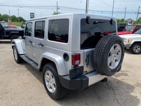 Used 2012 Jeep Wrangler Unlimited Sahara w/ Dual Top Group AWD/4WD image 5