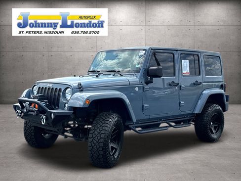 Used 2014 Jeep Wrangler Unlimited Sahara w/ Dual Top Group AWD/4WD image 4