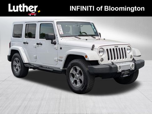 Used 2015 Jeep Wrangler Unlimited Sahara w/ Dual Top Group AWD/4WD image 1