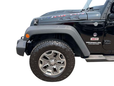 Used 2013 Jeep Wrangler Unlimited Rubicon w/ Dual Top Group AWD/4WD image 9