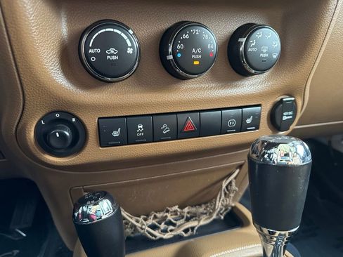 Used 2012 Jeep Wrangler Unlimited Sahara w/ Dual Top Group AWD/4WD image 34