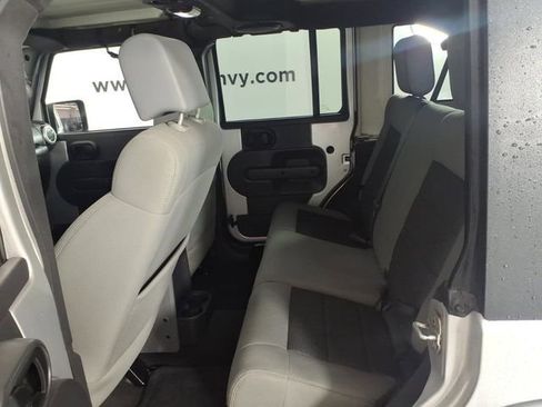 Used 2010 Jeep Wrangler Unlimited Sahara w/ Dual Top Group AWD/4WD image 9