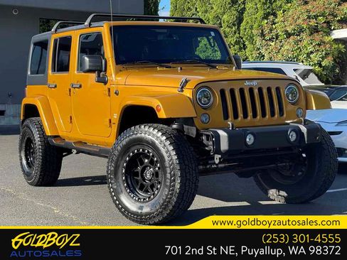 Used 2014 Jeep Wrangler Unlimited Sahara AWD/4WD image 1