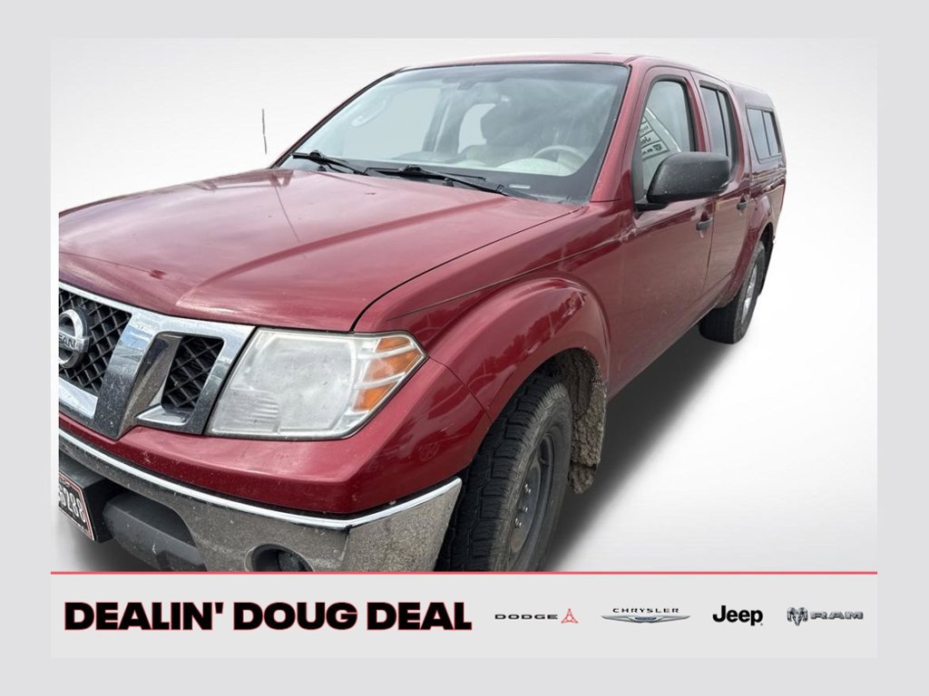 Used 2010 Nissan Frontier SE AWD/4WD image 1