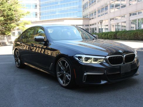 Used 2020 BMW M550i xDrive w/ Executive Package AWD/4WD image 1