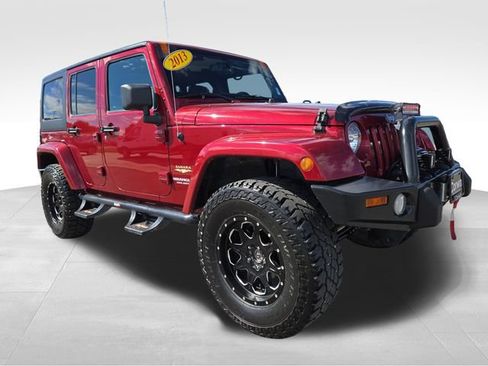 Used 2013 Jeep Wrangler Unlimited Sahara w/ Trailer Tow Group AWD/4WD image 1