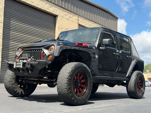 Used 2013 Jeep Wrangler Unlimited Sahara w/ Mopar Chrome Edition Group AWD/4WD image 37