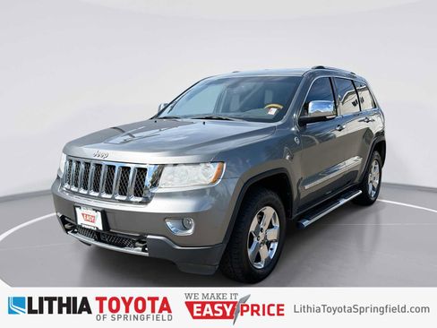 Used 2013 Jeep Grand Cherokee Overland w/ Advance Technology Group AWD/4WD image 1