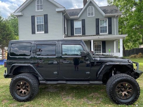 Used 2012 Jeep Wrangler Unlimited Sahara w/ Dual Top Group AWD/4WD image 7