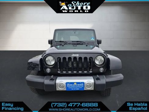 Used 2014 Jeep Wrangler Unlimited Sahara w/ Dual Top Group AWD/4WD image 2