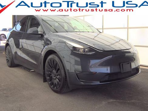 Used 2024 Tesla Model Y Long Range AWD/4WD image 1