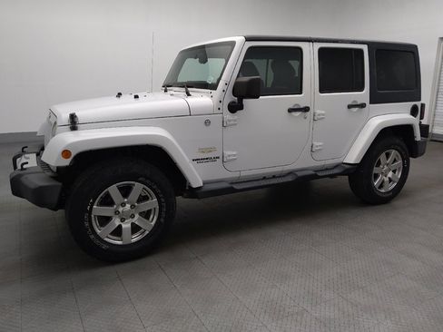 Used 2014 Jeep Wrangler Unlimited Sahara w/ Dual Top Group image 2