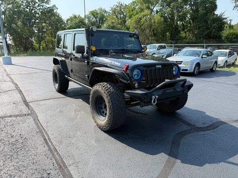 Used 2015 Jeep Wrangler Unlimited Rubicon AWD/4WD image 1