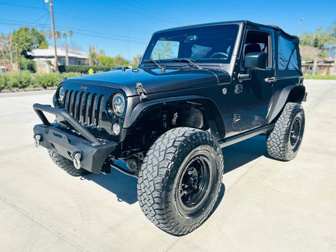 Used 2016 Jeep Wrangler Sport image 1