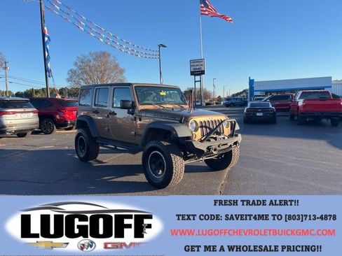 Used 2015 Jeep Wrangler Unlimited Rubicon w/ Dual Top Group image 1