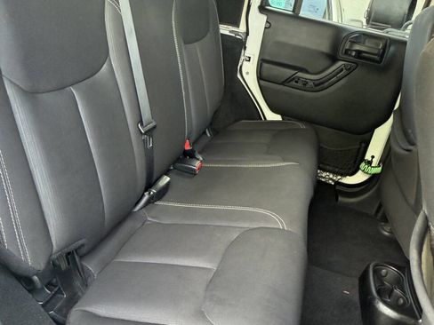 Used 2014 Jeep Wrangler Unlimited Rubicon w/ Dual Top Group AWD/4WD image 14