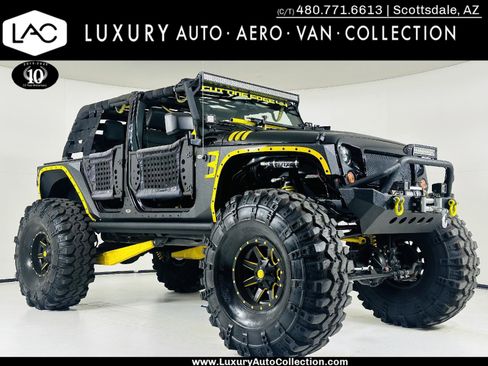 Used 2012 Jeep Wrangler Unlimited Sahara w/ Connectivity Group image 1