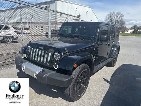 Used 2015 Jeep Wrangler Unlimited Sahara w/ Dual Top Group image 1