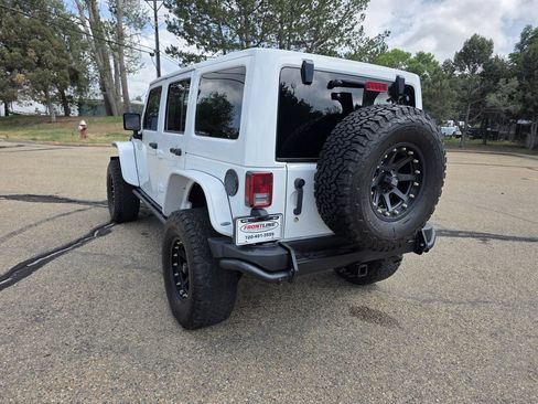 Used 2013 Jeep Wrangler Unlimited Sahara w/ Dual Top Group AWD/4WD image 4