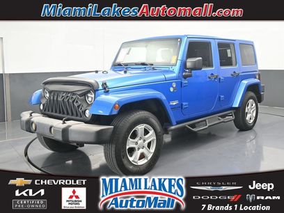 Used 2015 Jeep Wrangler Unlimited Sahara w/ Dual Top Group