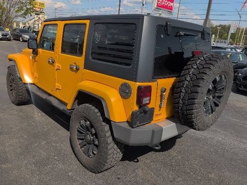 Used 2013 Jeep Wrangler Unlimited Sahara w/ Dual Top Group AWD/4WD image 6