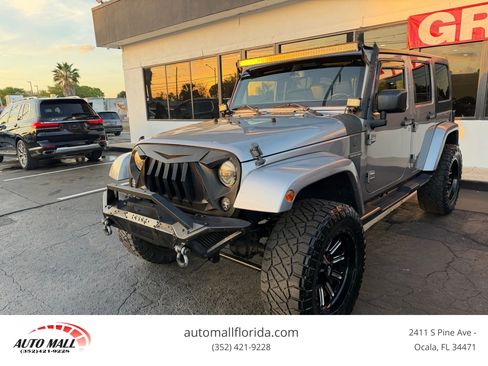 Used 2016 Jeep Wrangler Unlimited Sport image 1