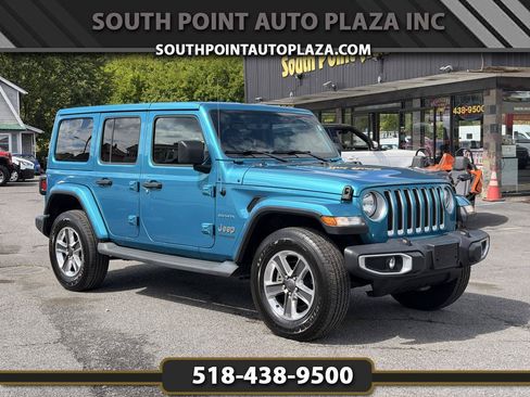 Used 2019 Jeep Wrangler Unlimited Sahara w/ Uconnect 4C Nav & Sound Group AWD/4WD image 1