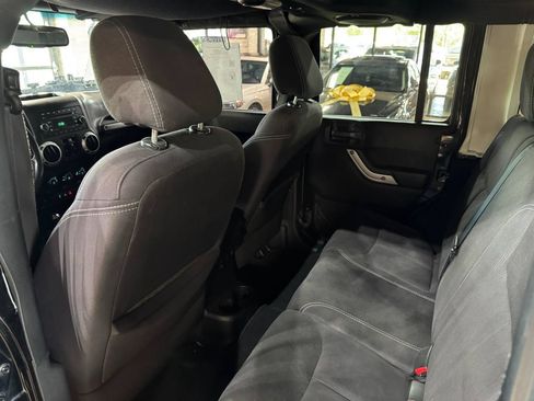Used 2014 Jeep Wrangler Unlimited Sahara w/ Connectivity Group AWD/4WD image 13
