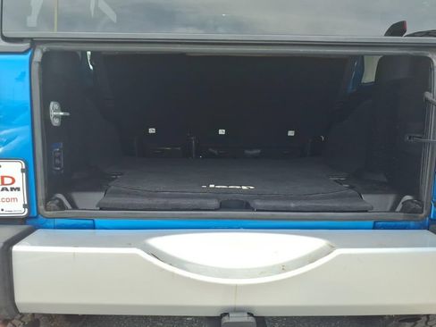 Used 2015 Jeep Wrangler Unlimited Sahara w/ Dual Top Group AWD/4WD image 14