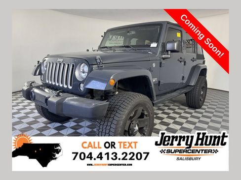 Used 2016 Jeep Wrangler Unlimited Sahara AWD/4WD image 1